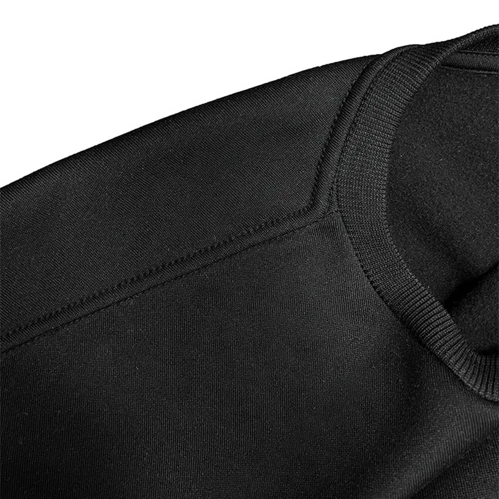 black ribbed knit crew neck long sleeve sweatshirt featuring smooth textured fabric and neatly stitched seams for women’s casual wear.