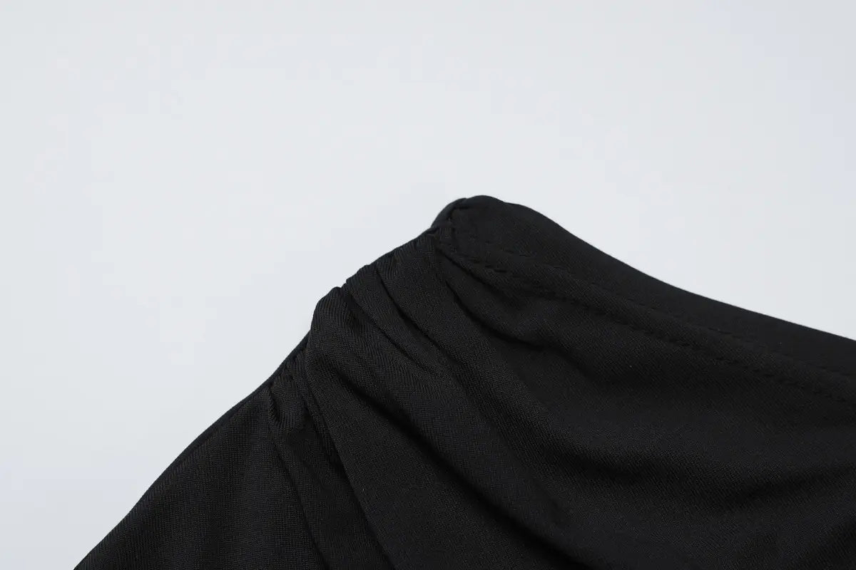 black fabric featuring a gathered ruched neckline on a sexy slim oblique shoulder floral mermaid dress