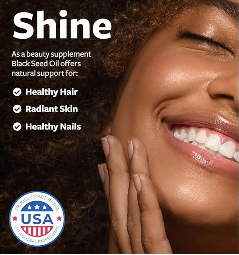 a black seed oil supplement bottle with sleek dark-colored label featuring white text and an american flag emblem containing black seed oil capsules