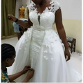 White lace african mermaid detachable wedding dress with beaded detailing and fitted bodice for elegant occasions