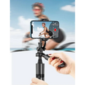 Black smartphone mounted on a selfie stick with adjustable grip and extendable arm for 360° ai face tracking gimbal use