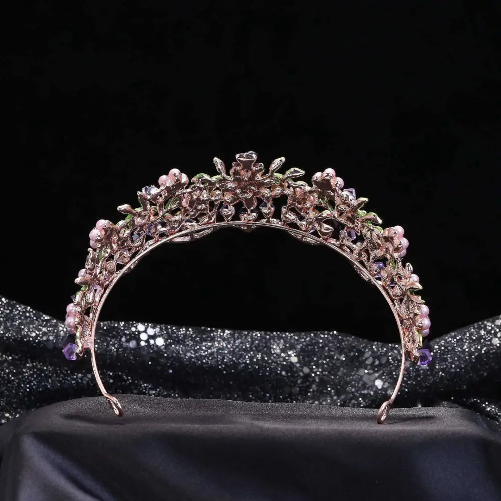 Delicate rose gold alloy crystal flowers wedding bridal tiara with pink and purple gemstones and green leaf accents