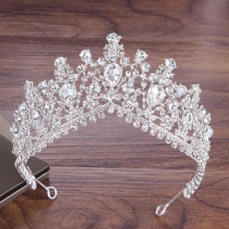 A sparkling silver alloy diamond accessories tiara with floral crystal jewelry design and teardrop pendant stones