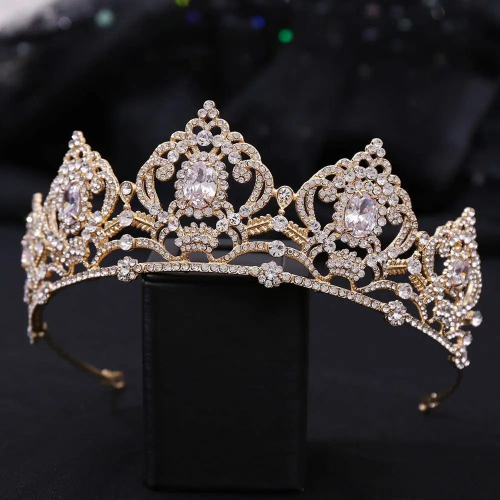 A silver and gold alloy electroplate crown with crystals pearls and intricate leaf metalwork crowns korean style
