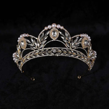 A silver and gold alloy electroplate crown with crystals pearls and intricate leaf metalwork crowns korean style