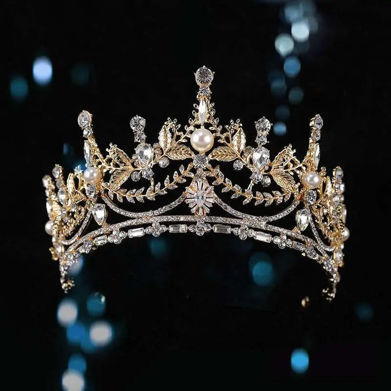 An ornate gold alloy electroplate crown with intricate leaf motifs, clear crystals, and white pearls crowns korean style