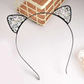 Black cat ear headband with sparkling clear and iridescent rhinestones featuring alloy spot drill rabbit ears rhinestone design