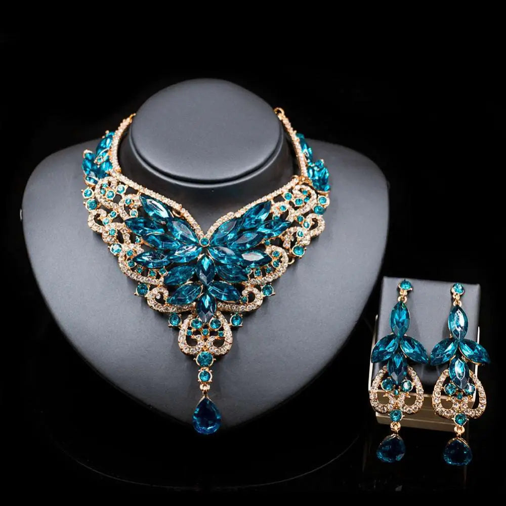 Elegant turquoise and gold toned crystal choker necklace with leaf and butterfly motifs in american color exaggerated bride jewelry set