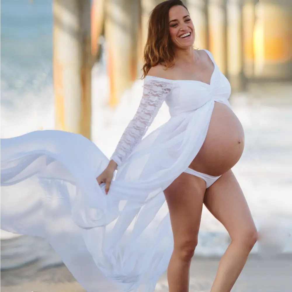 American white sexy maternity dress with flowing off-the-shoulder design and long sleeve lace detailing