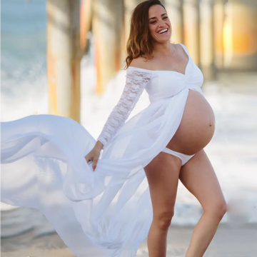 American white sexy maternity dress with flowing off-the-shoulder design and long sleeve lace detailing