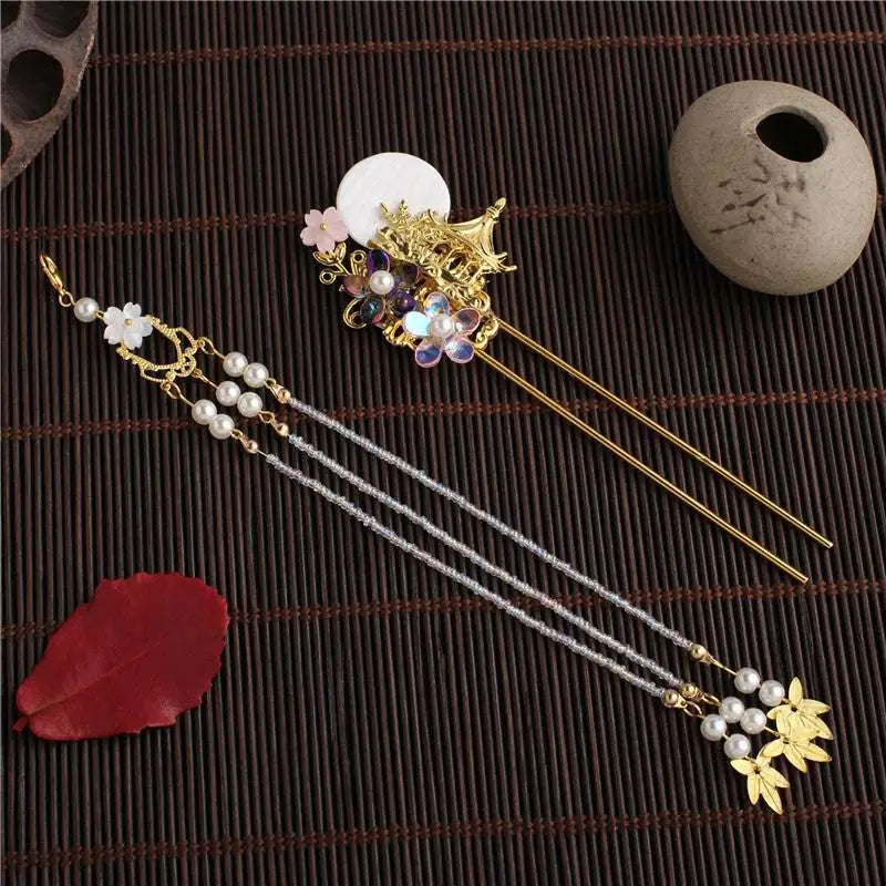 Elegant gold ancient costume hairpin adorned with white jade disc, iridescent gemstones, and hairpin accessories tassel pearls