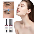 Two sleek silver-toned anti-aging regenerating serum bottles with purple and gold labels for wrinkle hydrating care