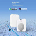 White rectangular apple find my locator pet tracking device with circular silver accent and wireless charging button