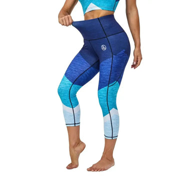 Aqua high waisted tummy control yoga pants in blue and teal gradient with geometric paneling for enhanced support