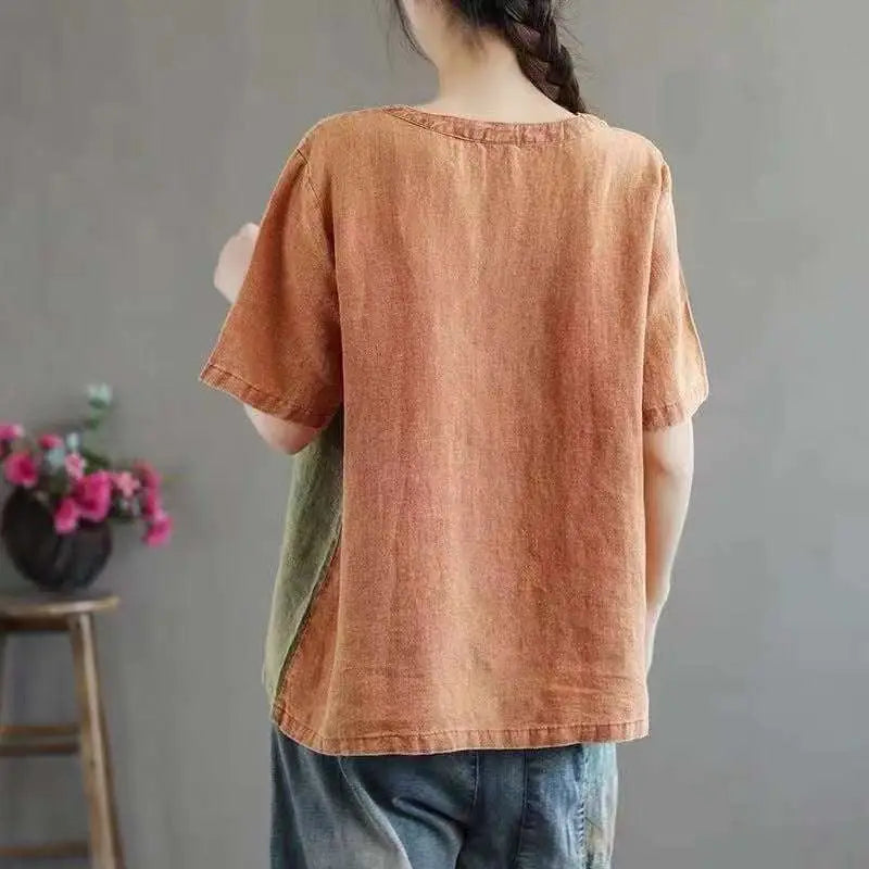 A soft rust-colored artistic design half sleeve cotton linen contrast top with relaxed fit and short sleeves