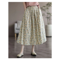 A flowing high-waisted midi skirt in artistic floral washed cotton with a soft cream base and delicate floral pattern