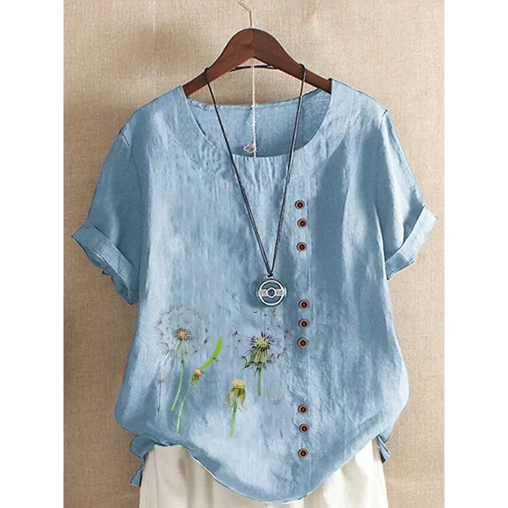Light blue linen printed casual shirt with embroidered dandelion designs and brown buttons down the front