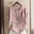 Artistic retro cotton dandelion printed casual shirt in soft pink linen with embroidered dandelion designs and brown buttons