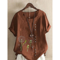 Artistic retro cotton dandelion printed linen top in rust with delicate embroidered dandelion designs and brown buttons