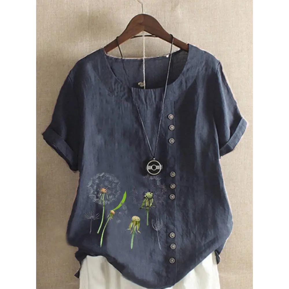 Dark blue linen printed casual top featuring embroidered dandelion designs and brown buttons for a retro look