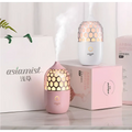 Asakusa pink aroma diffuser in pink honeycomb-patterned design emitting gentle mist for home relaxation