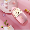 Asakusa pink aroma ultrasonic humidifier with a pink honeycomb-patterned metallic mesh cover and gentle mist output
