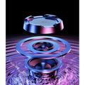 A sleek metallic multi-layered speaker driver with concentric rings in ambient light gaming bluetooth speakers