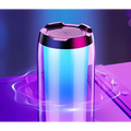 A sleek cylindrical led gaming bluetooth speaker with a translucent body glowing blue and purple for ambient light gaming
