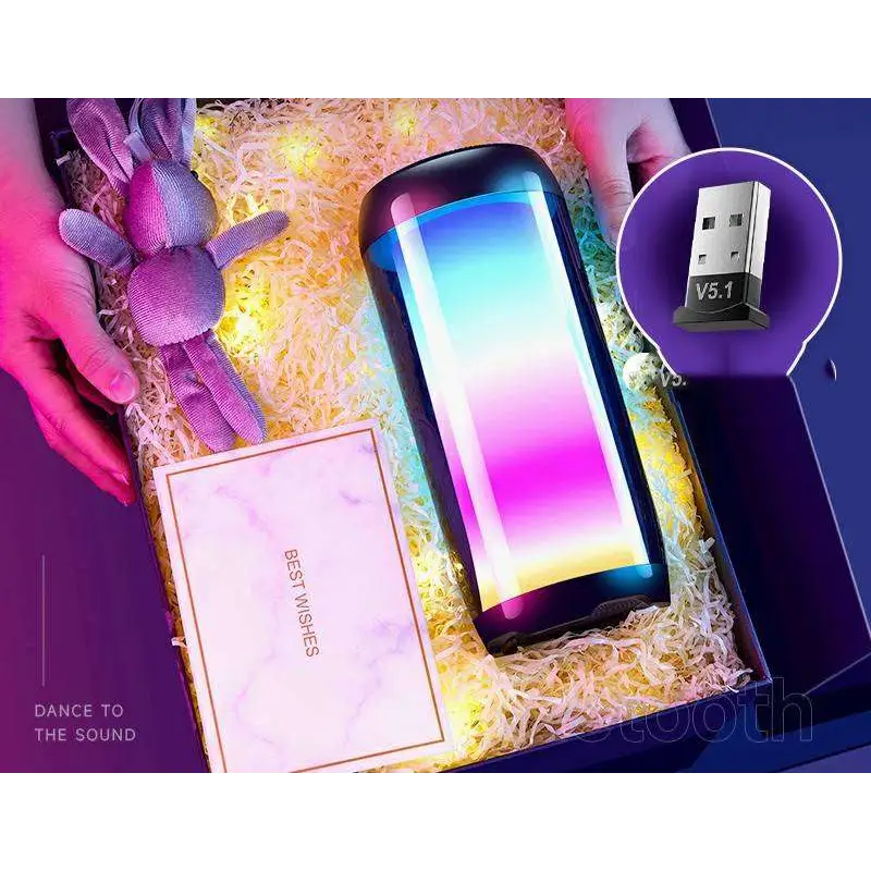 A sleek cylindrical led wireless bluetooth speaker with vibrant blue to pink ambient light gaming display