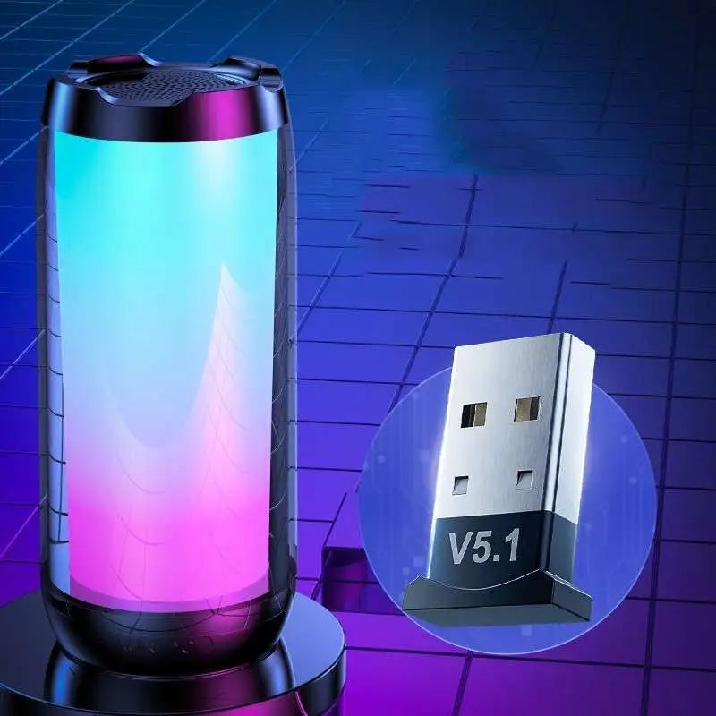 A sleek cylindrical led wireless speaker with translucent blue and pink ambient light gaming bluetooth design