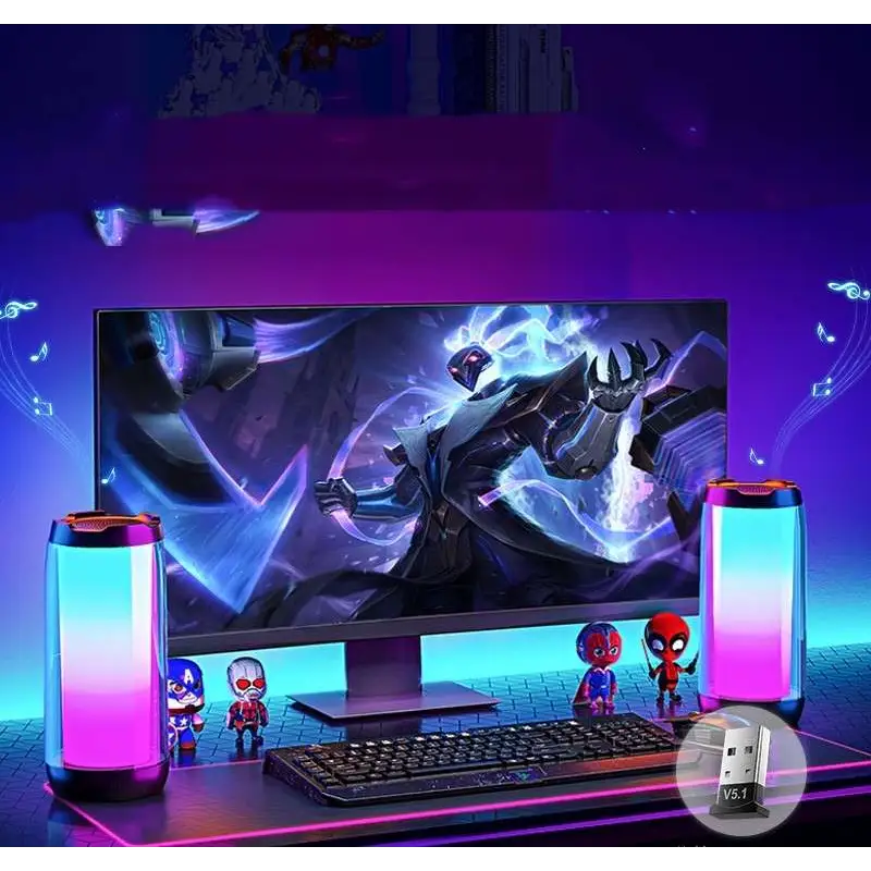 A sleek modern gaming monitor with vibrant graphics and ambient light gaming bluetooth speakers with cylindrical led