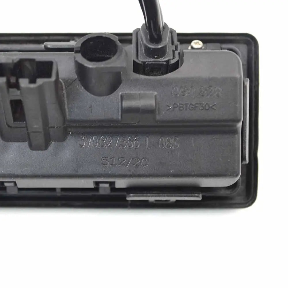 Black plastic audi a4 s4 avant reverse camera handle with molded housing and orange-and-white striped wiring connector back side