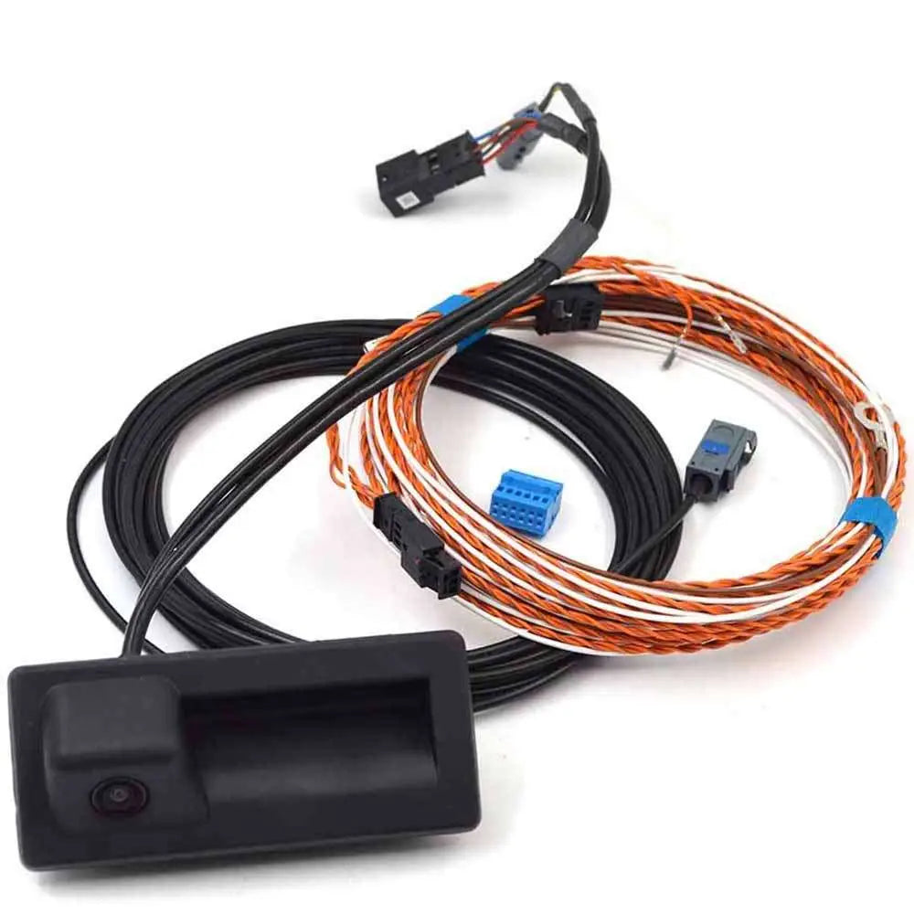 Black plastic audi a4 s4 avant reverse camera handle with integrated lens and orange-and-white striped wiring harnesses