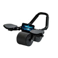 Black plastic automatic rebound abdominal wheel with textured wheels and padded footrests for home workouts
