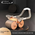 Orange automatic rebound abdominal wheel with silver handle and wheels on a kneeling mat for core exercises