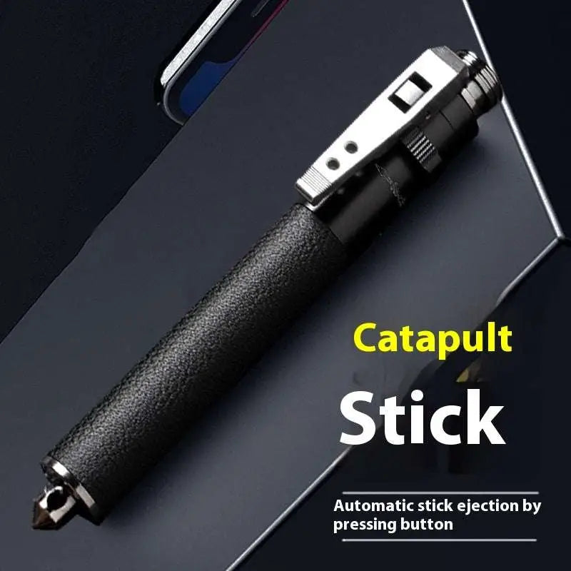 Black textured grip self-defense baton with silver metallic accents and clip featuring automatic spring aluminium alloy construction