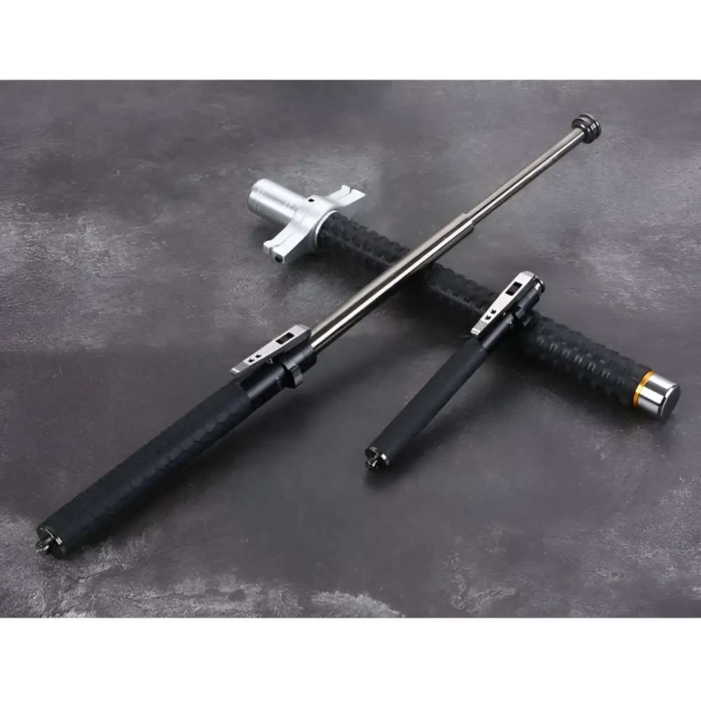 Automatic spring silver self-defense baton with black textured grip and aluminium alloy construction for protection