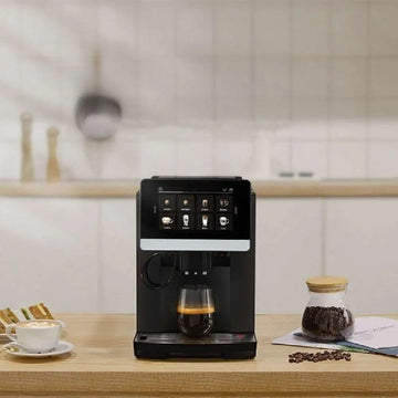 Black automatic touch screen small coffee machine with sleek digital interface and glass cup filled with coffee beneath spout