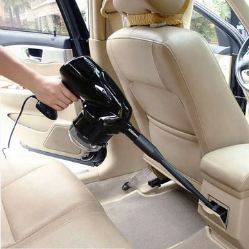Black handheld dry wet vacuum with transparent dust container and extendable hose for automobile household use