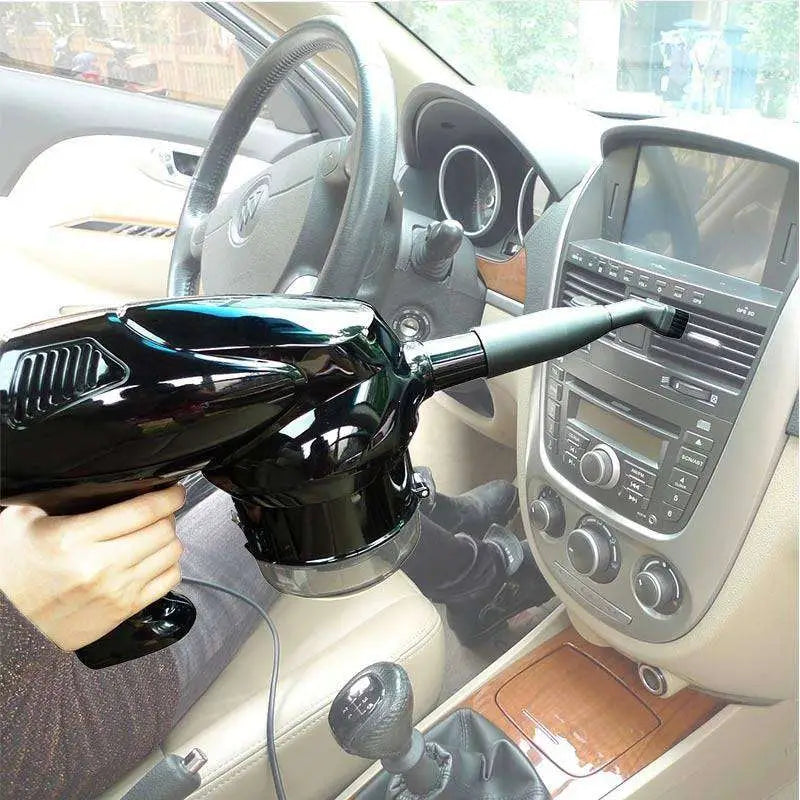 Black handheld automobile household dry wet vacuum cleaner with sleek glossy finish, extendable nozzle, and transparent dust container