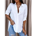 Autumn simplicity long white shirt with loose fit, rolled sleeves, and slightly asymmetrical hem perfect for fall style