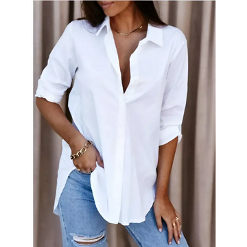 Autumn simplicity long white shirt with loose fit, rolled sleeves, and slightly asymmetrical hem perfect for fall style
