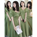 Olive green satin midi dress with puffed sleeves and pearl chain detail from avocado green sisters collection