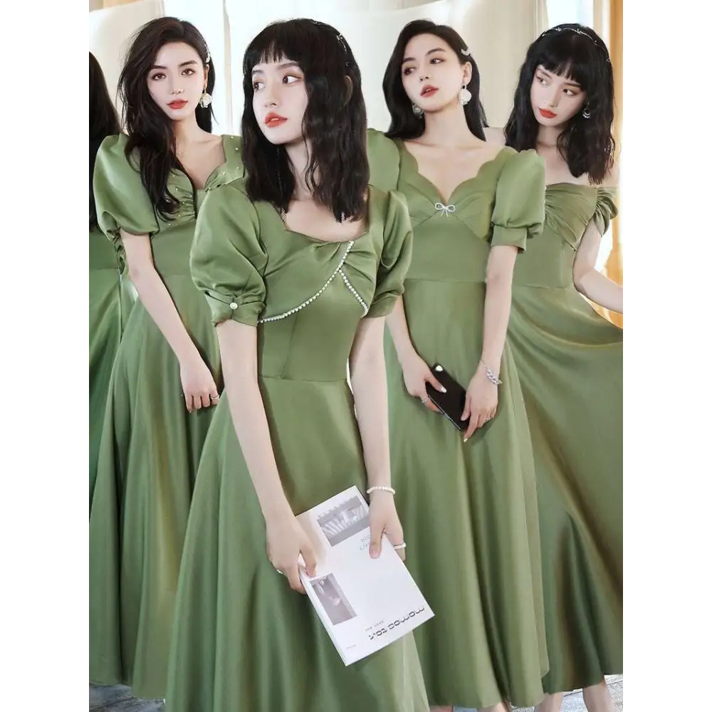 Olive green satin midi dress with puffed sleeves and pearl chain detail from avocado green sisters collection