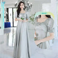 Light gray satin midi dress with square neckline puffed sleeves and pearl embellishments by avocado green sisters