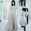 A flowing light gray satin midi dress with puffed sleeves and a bow-knot square neckline by avocado green sisters