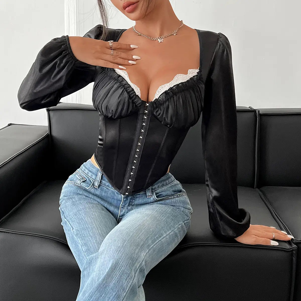black satin mesh patchwork lace chest top featuring white lace trim and ruched detailing in a satin and lace cotton blend