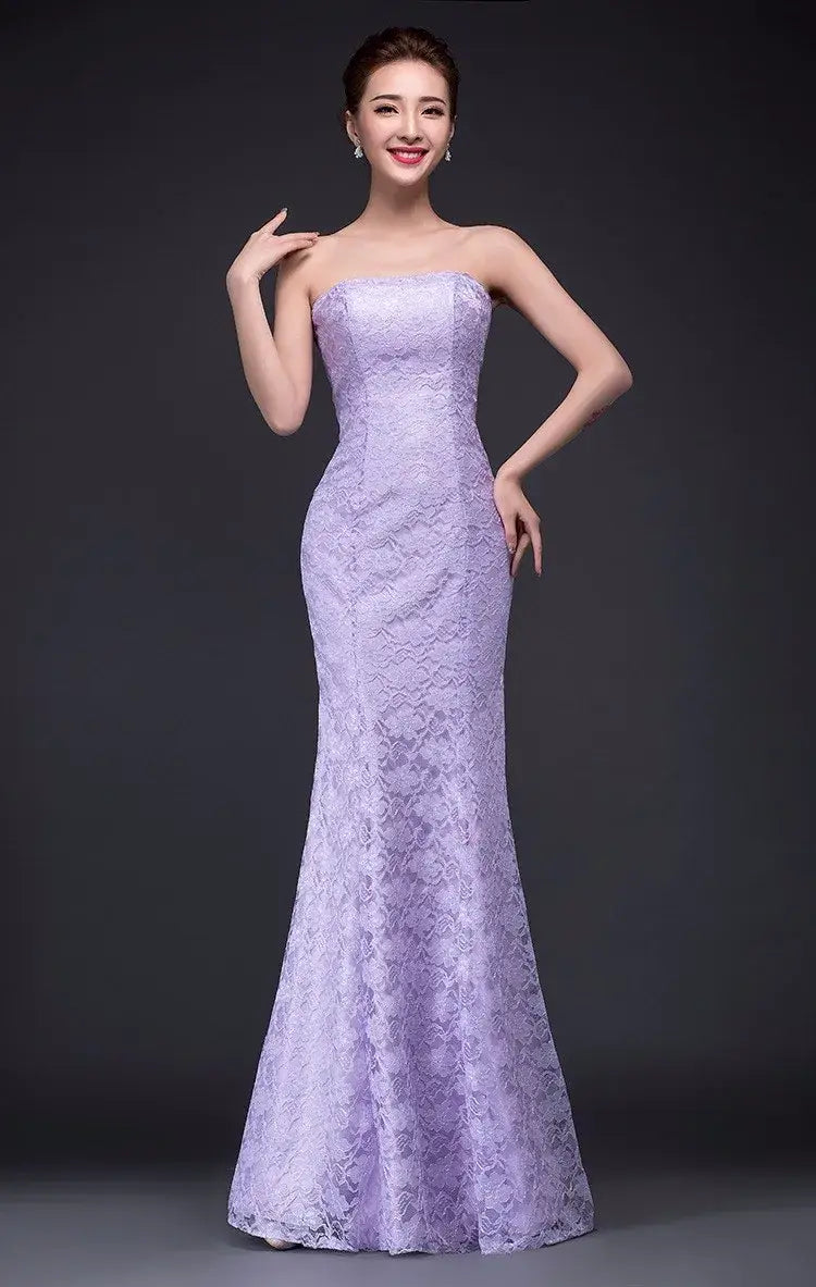 A lavender lace wedding dress featuring a strapless fitted bodice and a flowing mermaid-style long dress suitable for formal occasions.