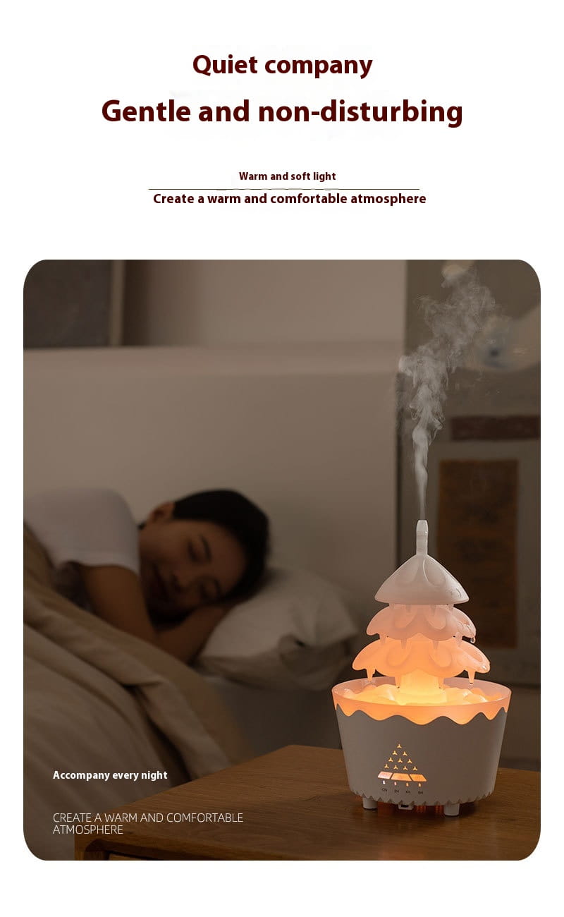 a soft tiered white and gray ceramic essential oil aroma diffuser with a warm glow in a Christmas tree design essential oil aroma diffuser humidifier