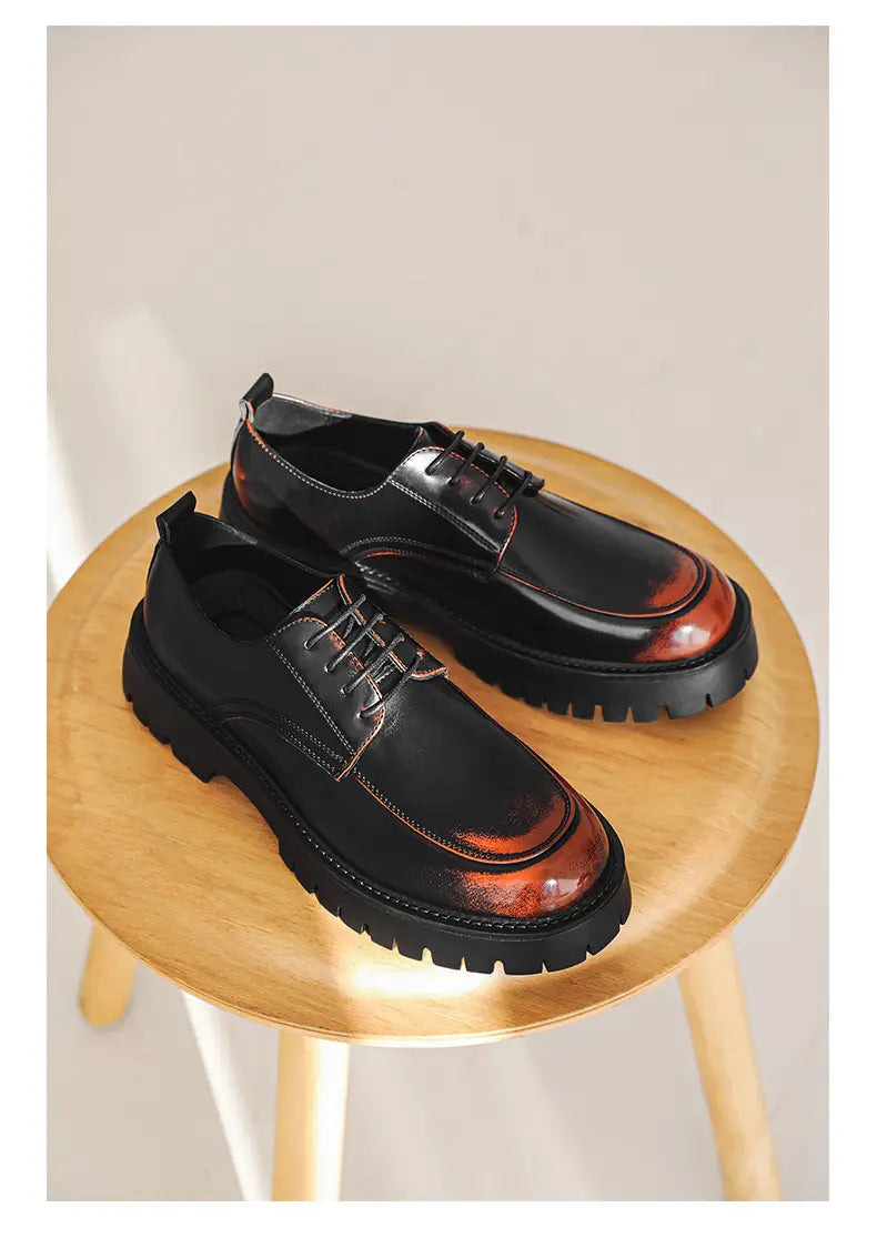 Black leather casual leather oxford shoes with glossy finish and reddish-brown toe caps featuring red stitching for men’s casual leather wear.